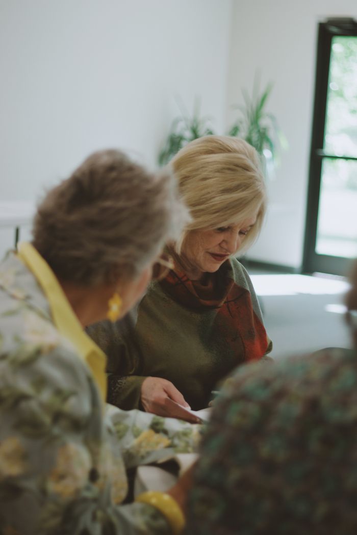 about-02 Women engaged in a Bible study session at a local church in Brevard, NC.